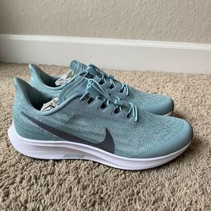 BRAND NEW: Blue Women’s Nike Sneaker (Size 9.5)
